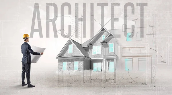 年轻工程师持有带有Architect题词 住宅规划概念的蓝图 — 图库照片