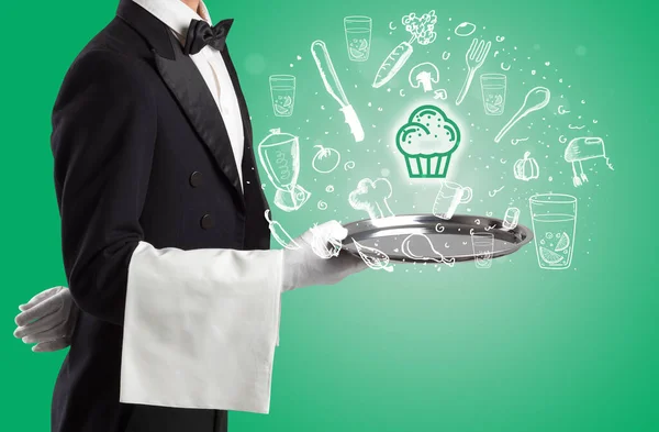 Kelner Trzymający Srebrną Tacę Wychodzącymi Niej Ikonami Babeczek Koncepcja Zdrowej — Zdjęcie stockowe