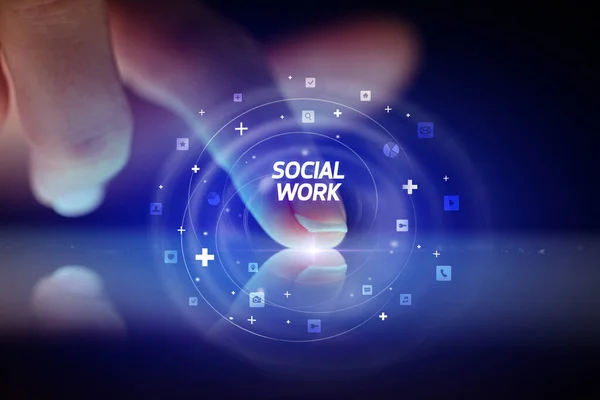 有社交媒体图标和社会工作的手指触摸平板电脑 — 图库照片