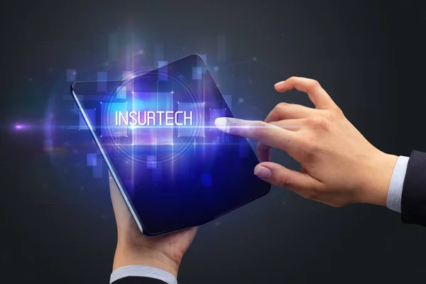 Businessman Holding Foldable Smartphone Insurtech Inscription New Technology Concept — Stock Photo, Image
