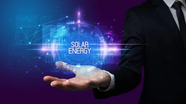 Man Hand Holding Solar Energy Inscription Technology Concept — ストック写真