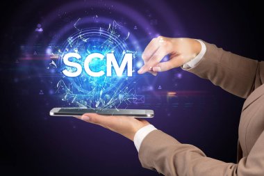 SCM kısaltmalı bir dokunmatik ekran, modern teknoloji konsepti