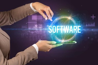 SOFTWARE yazıtlı bir dokunmatik ekran yakın plan, yeni teknoloji kavramı