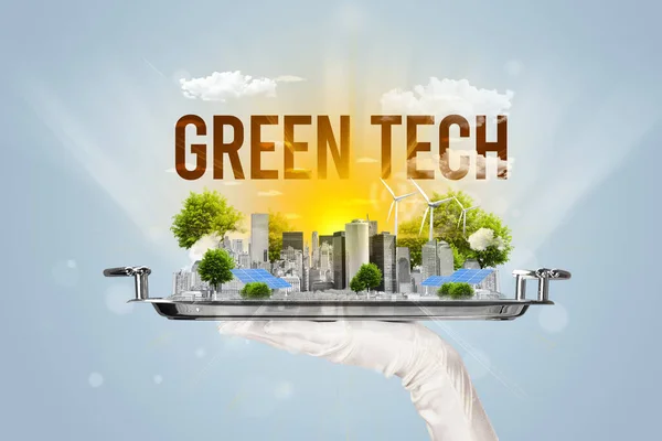 Waiter serving eco city with GREEN TECH inscription, renewabke energy concept