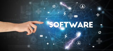 SOFTWARE yazıtlarına el işareti, modern teknoloji kavramı