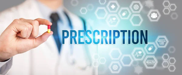 stock image Close-up of a doctor giving you a pill with PRESCRIPTION inscription, medical concept