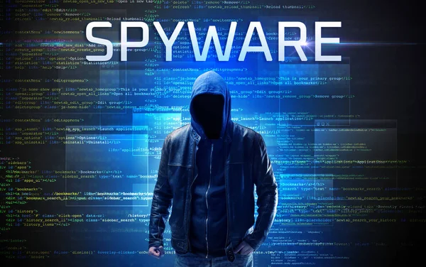 stock image Faceless hacker with SPYWARE inscription on a binary code background