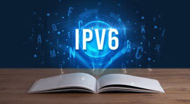 IPV6 yazıları açık bir kitaptan geliyor, dijital teknoloji kavramı.