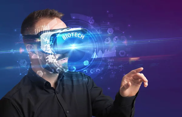 Businessman Looking Virtual Reality Glasses Biotech Inscription Innovative Technology Concept — Stock Photo, Image