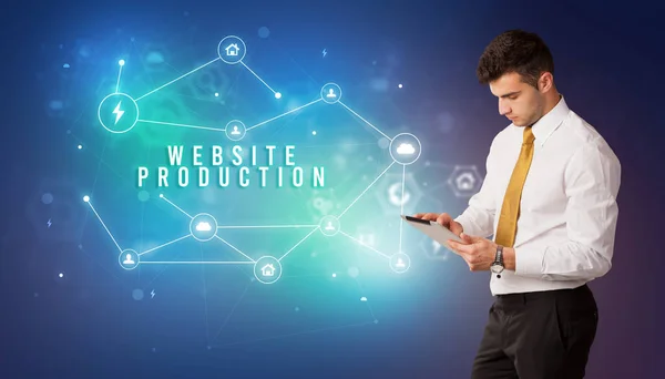 Podnikatel Před Ikonami Cloudových Služeb Nápisem Web Production Moderní Koncept — Stock fotografie