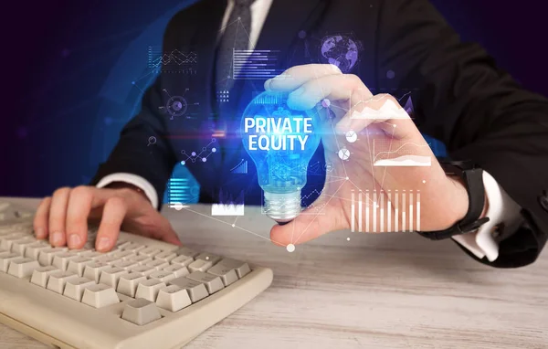 Businessman Holding Lightbulb Private Equity Inscription Business Idea Concept — Stock Photo, Image