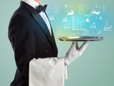 Smokinli yakışıklı garson, elinde tablada tablo simgeleri, küresel piyasa konsepti var.