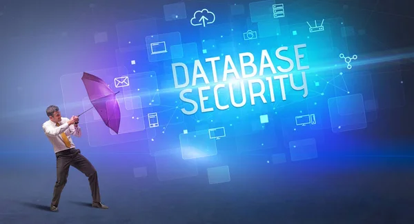 Affärsman Som Försvarar Med Paraply Från Cyberattack Och Database Security — Stockfoto