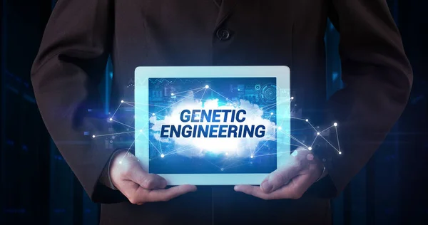 Young Business Person Working Tablet Shows Inscription Genetic Engineering — Stock Photo, Image