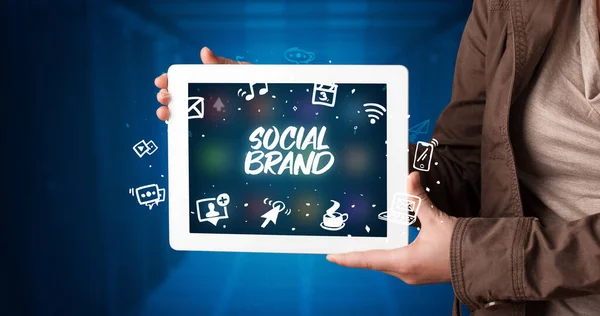 Young Business Person Working Tablet Shows Inscription Social Brand — Stock Photo, Image