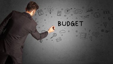 İş adamı bütçe yazıtları ve iş stratejisi konseptiyle yaratıcı bir fikir çizimi yapıyor.