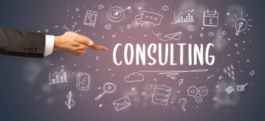 Kesilmiş ellerin yakın çekimi CONSULTING yazıt, modern iş çözümü kavramı