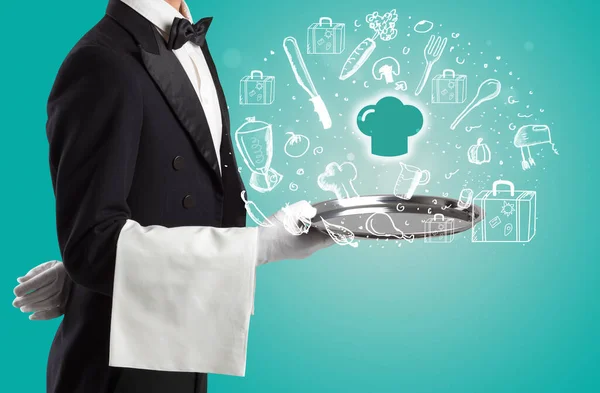 Kelner Trzymający Srebrną Tacę Wychodzącymi Niej Ikonami Kapelusza Szefa Kuchni — Zdjęcie stockowe
