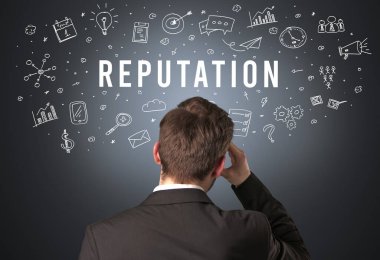 REPUTATION yazıtları, modern iş konsepti olan bir işadamının arka görüşü