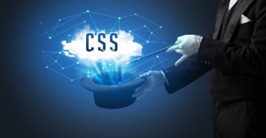 Sihirbaz, CSS kısaltması olan modern teknoloji konseptiyle sihirbazlık numarası yapıyor.