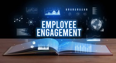 EMPLOYEE ENGAGEMENT inscription coming out from an open book, creative business concept