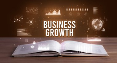 Açık bir kitaptan çıkan İş Büyüme yazıt, yaratıcı iş konsepti