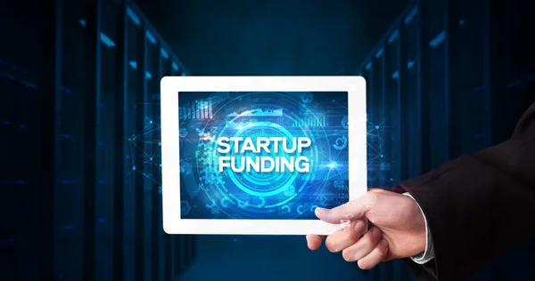 Young Business Person Working Tablet Shows Inscription Startup Funding Business — Stock Photo, Image