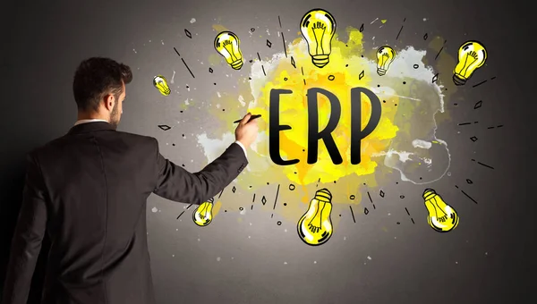 Businessman Drawing Colorful Light Bulb Erp Abbreviation New Technology Idea — Stock Photo, Image
