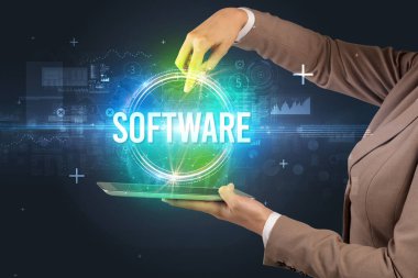 SOFTWARE yazıtlı bir dokunmatik ekran yakın plan, yeni teknoloji kavramı