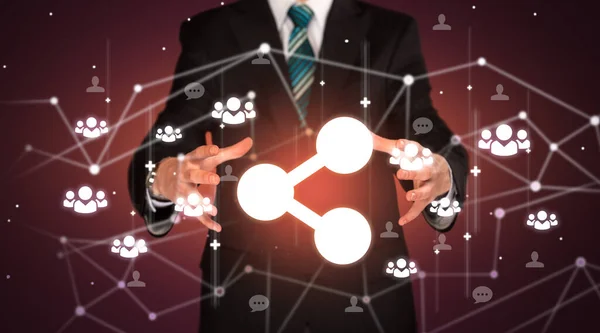 Hand holdig network icon around his hands, Social networking concept