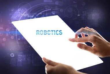 ROBOTICS yazıtlı el yapımı fütüristik tablet, yeni teknoloji kavramı