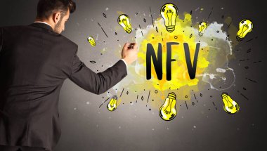 businessman drawing colorful light bulb with NFV abbreviation, new technology idea concept