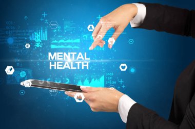 MENTAL Sağlık Yazıtları ve Tıbbi Konsept içeren bir dokunmatik ekran yakın plan