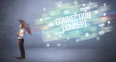 CONNECTION CONCEPT yazıtlarından şemsiye ile yakışıklı iş adamı savunması, yeni çağ medya kavramı