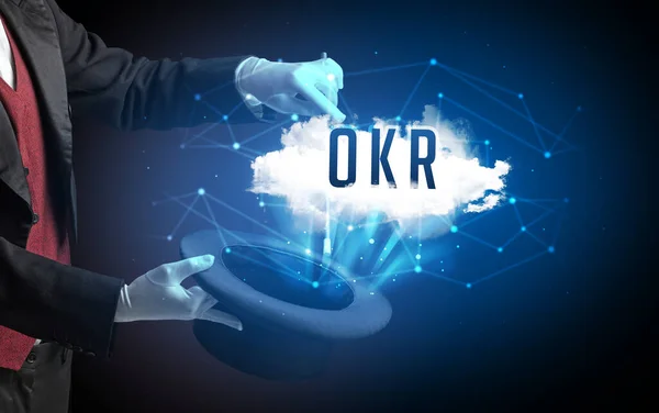 魔术师用现代科技概念Okr的缩写来展示魔术 — 图库照片