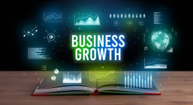 Açık bir kitaptan çıkan İş Büyüme yazıt, yaratıcı iş konsepti