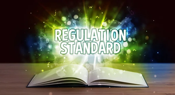 REGULATION STANDARD inscription coming out from an open book, educational concept