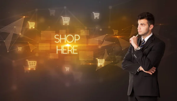 Zakenman Met Winkelwagenpictogrammen Shop Hier Inscriptie Online Shopping Concept — Stockfoto