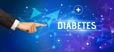Kesilen elin yakın çekimi DIABETES yazıtına, tıbbi konsepte işaret ediyor