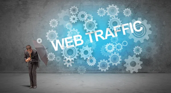 Businessman Defending Umbrella Web Traffic Inscription Technology Concept — Stock Photo, Image