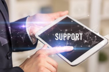 El kapama işlemini SUPPORT yazması, modern iş teknolojisi kavramı kullanan tablet kullanarak yapın