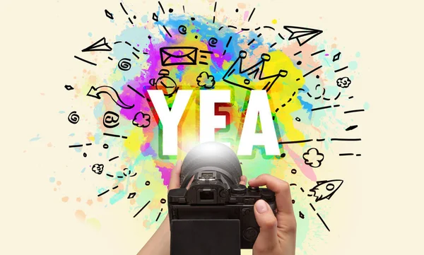 Close Hand Holding Digital Camera Abstract Drawing Yea Inscription — Stock Photo, Image
