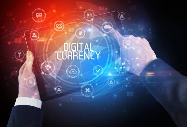 Dijital CURRENCY yazıtlı, yenilikçi teknoloji kavramına sahip bir tabletin yakın çekimi