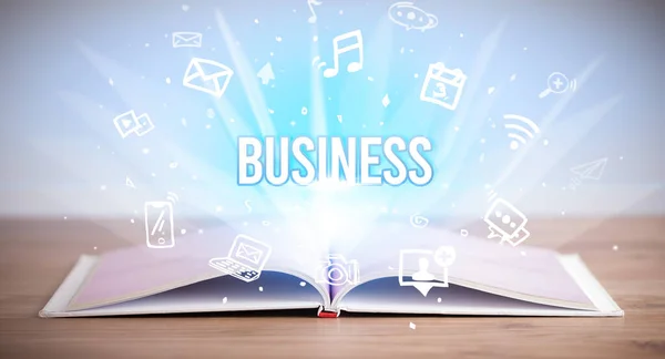 Opeen book with BUSINESS inscription, business concept