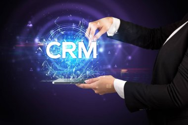 CRM kısaltmalı dokunmatik ekran, modern teknoloji kavramı