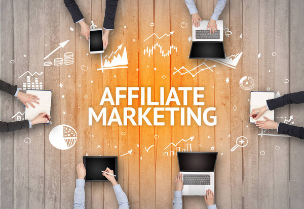 Group of Busy People Working in an Office with AFFILIATE MARKETING inscription, succesfull business concept