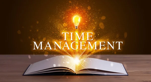 TIME MANAGEMENT inscription coming out from an open book, educational concept