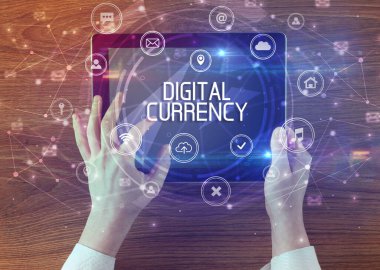 Dijital CURRENCY yazıtlı, yenilikçi teknoloji kavramına sahip bir tabletin yakın çekimi
