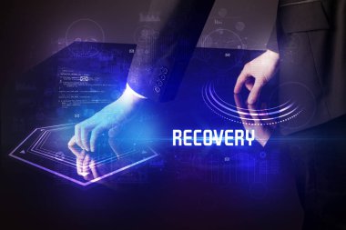 Elle dokunulan dijital tablo RECOVERY yazıtları, yeni çağ güvenlik kavramı