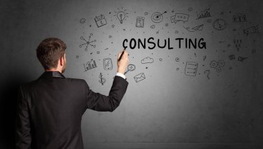 businessman drawing a creative idea sketch with CONSULTING inscription, business strategy concept
